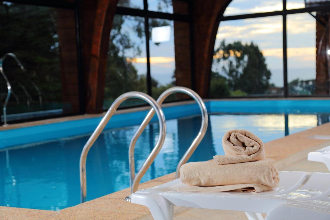 Cabanas Y Spa Costa Patagonia - Piscina Climatizada ปิชิเลมู ภายนอก รูปภาพ